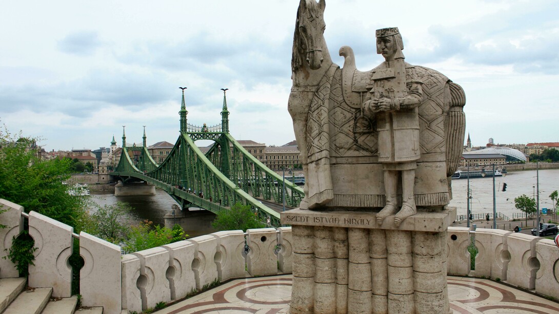 Statue of Saint Stephen standing in Budapest as a tribute to Hungary’s first king, overlooking the historic skyline and the Danube River, Budapest, Hungary