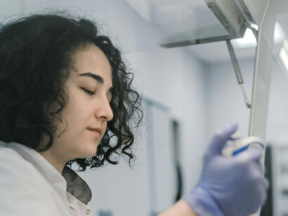 A female scientist immersed in her investigation