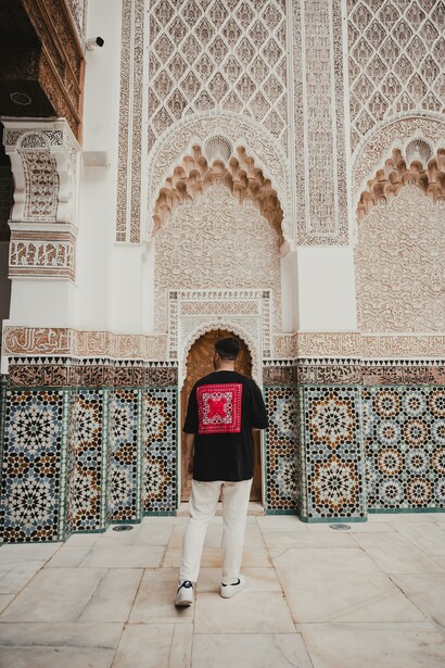 Man in Ben Youssef Madrasa in Marrakesh, Morocco 