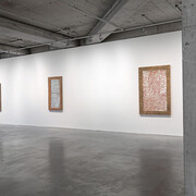 Five icons framed in edirne-style wooden ornamentation, exhibition view. Courtesy of Dirimart