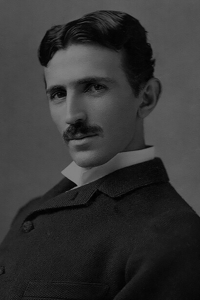 A photograph image of Nikola Tesla (1856-1943) at age 34