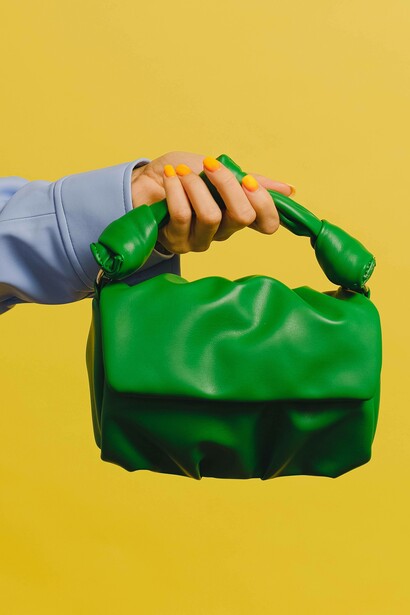 Cactus green handbag on display