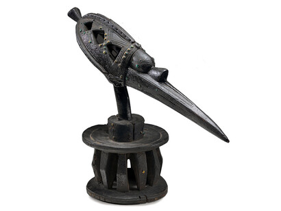 Shrine Figure Headdress, Guinea, Baga people, 19th century. Wood and brass-coated ferrous tacks, 20 7/8 x 26 3/4 inches. Purchase: William Rockhill Nelson Trust through the George H. and Elizabeth O. Davis Fund, 2003.1