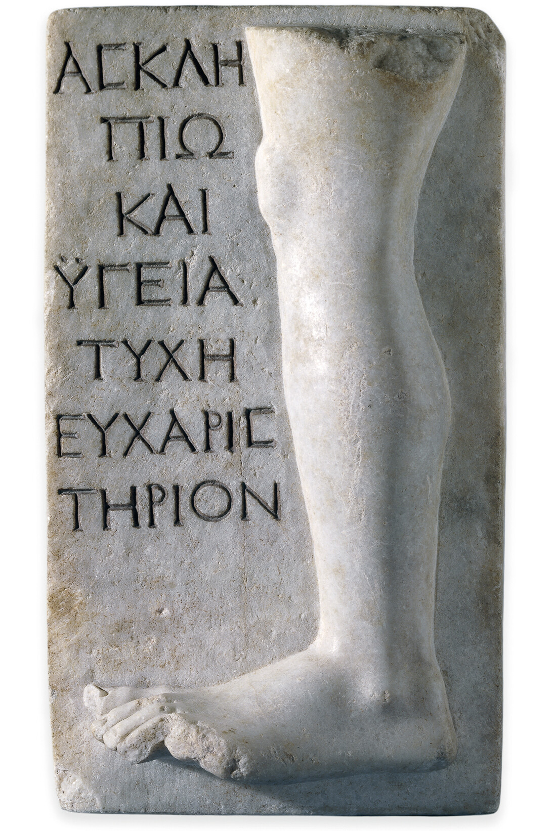 Μαρμάρινο αναθηματικό ανάγλυφο από τη Μήλο με παράσταση ποδιού και ευχαριστήρια επιγραφή του αναθέτη για την ίασή του προς τον Ασκληπιό και την Υγιεία, 150-200 μ.Χ., Λονδίνο, Βρετανικό Μουσείο
© The Trustees of the British Museum