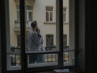 As they stand on the balcony, the city lights twinkling below, their hearts race, a testament to the powerful rush of dopamine coursing through them