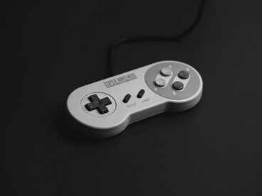 A Super Nintendo Entertainment System preserved well, reflecting the simplicity that defines early gaming eras