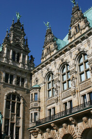 The iconic city hall in Hamburg, Germany, a vast Neo-Renaissance building built in 1897, a testament to cultural integration and the power of diverse perspectives
