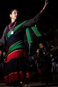 Members of the Newar community perform a traditional dance at Patan Durbar Square during the Lalit Carnival, celebrating World Tourism Day