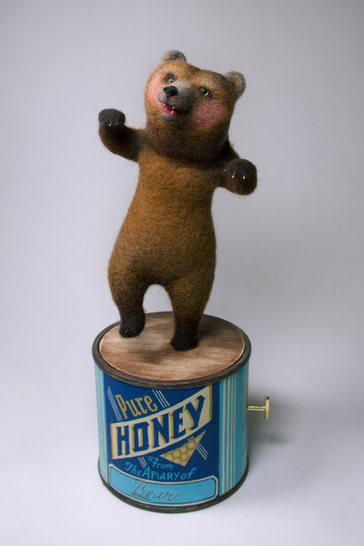 Dena Seiferling, Dancing Bear, Needle Felted on wire armature, hand lathed and painted vintage tin, music box mechanism, 14.5 x 5. Courtesy of Corey Helford Gallery