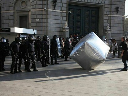 Inflatable cobblestone, action of Eclectic Electric Collective in co-operation with Enmedio collective during the General Strike in Barcelona, 2012, © Oriana Eliçabe/Enmedio.info