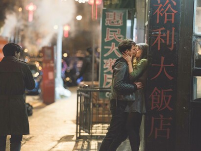 Tom Sturridge and Ella Purnell in the TV series “Sweetbitter” kissing in the street