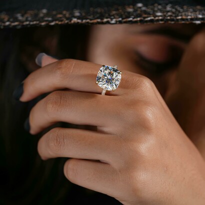 An elegant lab-grown diamond ring adorning a model’s hand