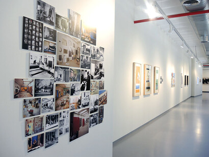 Installation view with of photographs of Motherwell's various studios and lithographs from the 1970s. Courtesy of the Dedalus Foundation Archives. 