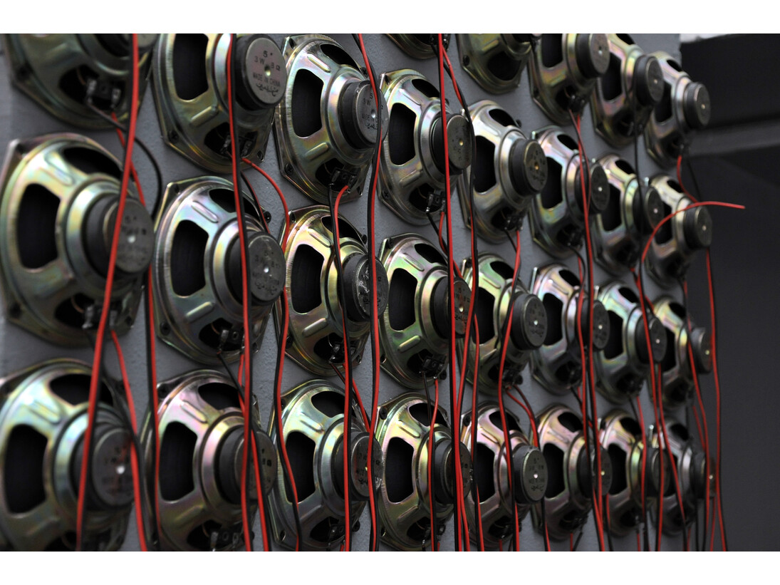 Magdi Mostafa, Wisdom Tower: from the series Sound Cells (Fridays), 2009-2012, 84 x 5 watt speakers, cables, audio amp, and monitor, Duration: 20 mins. Image courtesy and © the artist