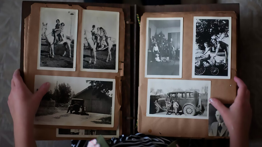A weathered photo album filled with faded memories