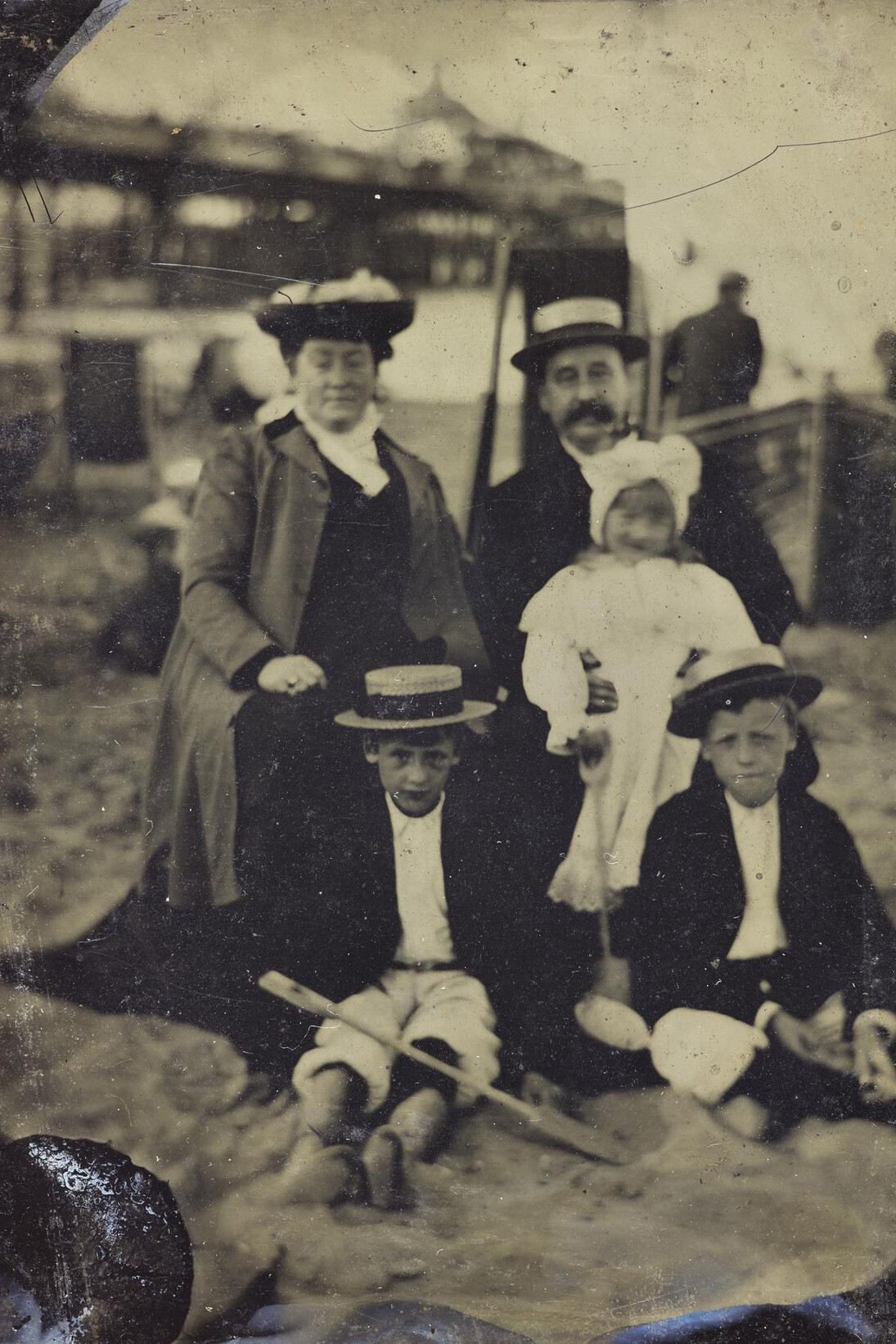 Family group on the beach at Margate: mother, father and three children, c.1875, tintype © Howarth-Loomes Collection at National Museums Scotland