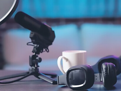 A vacant home production studio, equipped with professional podcasting tools, captures high-quality audio content tailored for streaming sites and entertainment platforms