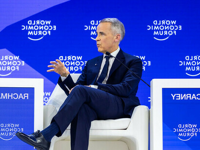Warning that those who refuse to participate end up on the menu, Carney challenges middle powers to abandon strategic resignation. ©2026 World Economic Forum / Ciaran McCrickard (via Flickr, Creative Commons license)