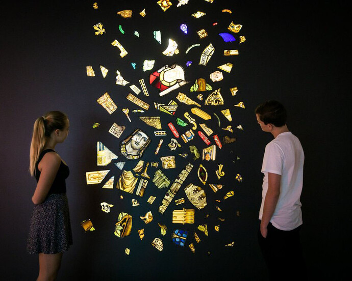 Kader Attia, Untitled, 2014, installation view, Kader Attia, Museum of Contemporary Art Australia, Sydney, 2017, 116 stained glass fragments, metal screw hooks and fluorescent fixtures, courtesy of the Rachel and Jean-Pierre Lehmann Collection, image courtesy the artist and Museum of Contemporary Art Australia © the artist, photograph: Anna Kučera