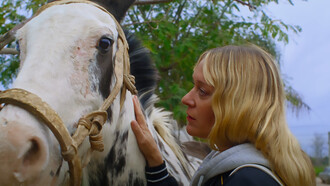 Magic Farm stars Chloë Sevigny as a woman drawn into the eerie beauty of a land where nature bends reality