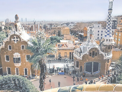 Park Güell in Barcelona is a colorful and whimsical public park designed by renowned architect Antoni Gaudí, known for its stunning mosaic work and unique architectural elements