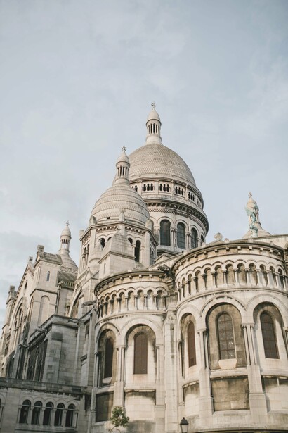 A domed Catholic cathedral in a city 