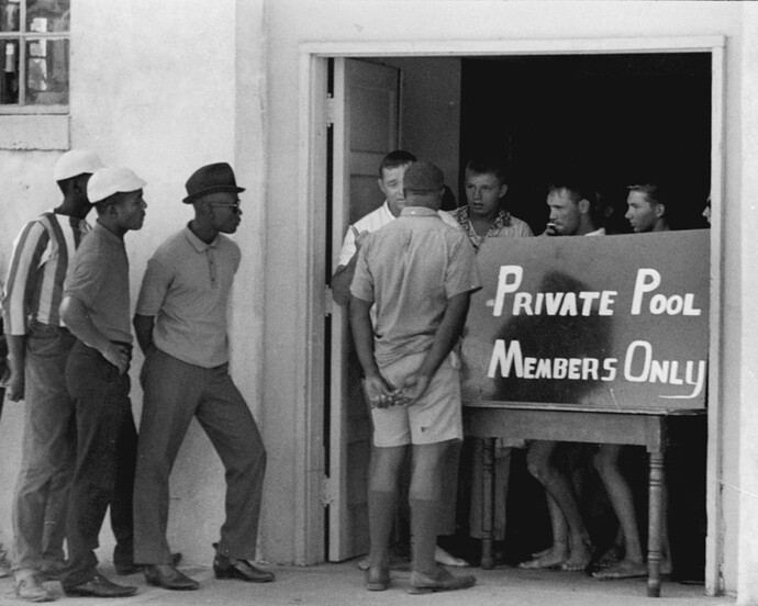 Demonstrations at an “all-white” swimming pool in Cairo, Illinois, 1962. Gelatin silver print, 11 x 14 inches. © Danny Lyon, New York & Magnum Photos, New York / Courtesy Edwynn Houk Gallery, New York.