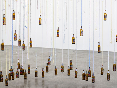 Divider, 2016 Knotted fabric, and beer bottles Dimensions approx. 210 x700 x340 cm
