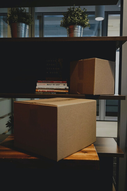 The space buzzed with excitement, brimming with carefully labeled boxes, each holding the promise of a new journey, a new home, and the anticipation of what lies ahead