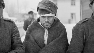 Soviet prisoners of war dressed in new clothes near the Arctic Circle at Rovaniemi, Finland, during the Winter War, fought in temperatures down to −43 °C 