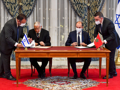 The signing of the diplomatic agreements between Morocco and Israel