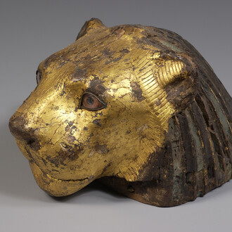 Piece of furniture in the form of a lion’s head Tamarisk wood, gold, glass, Late Period (664-332 BC) © Musée du Louvre, Dist. RMN-Grand Palais / Benjamin Soligny / Raphaël Chipault