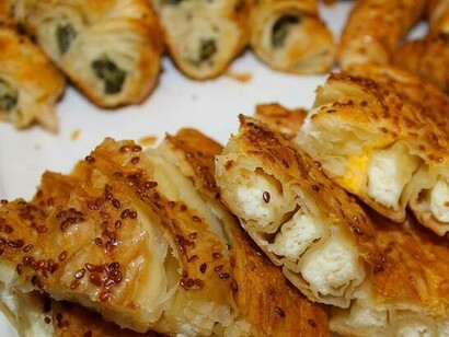 Cheese and spinach pastries can be found at Simit Sarayi, Amsterdam