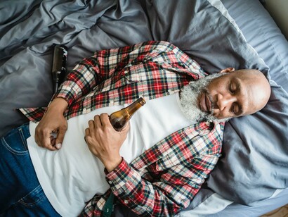 A man who is struggling with an alcohol addition 