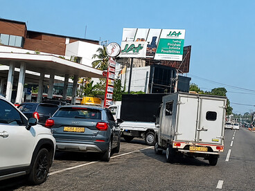 Residents queue for fuel in Colombo, Sri Lanka, as authorities impose rationing to manage shortages linked to global energy instability, forcing many drivers to arrive before dawn in hopes of obtaining petrol