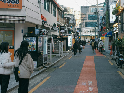 Street scene in Seoul with people walking through the city