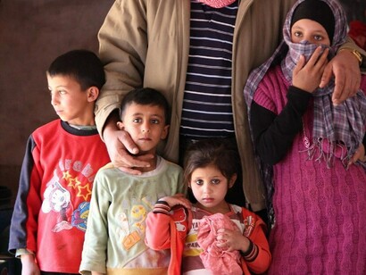Familia de refugiados sirios