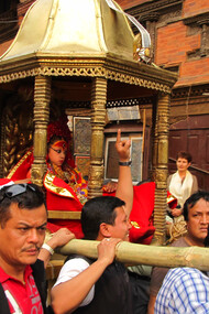 The living goddess Kumari returns to the Kumari Ghar after attending the Seto Machhindranath parade in Kathmandu, Nepal