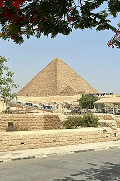 A stunning view of Egypt's majestic Giza Pyramids standing proudly in the background