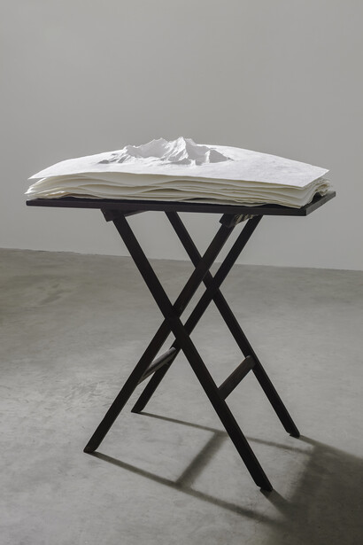 Dorothy Cross, Paper Mountain, 2014, cast paper (9 elements), wooden table, 105 x 92 x 62 cm, 41.3 x 36.2 x 24.4 in, courtesy of the artist and Kerlin Gallery, Dublin