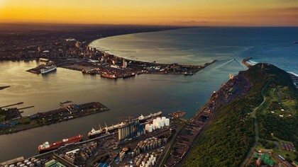 A vibrant aerial view of Durban harbour during sunset, representing Africa’s integration into global trade and financial networks