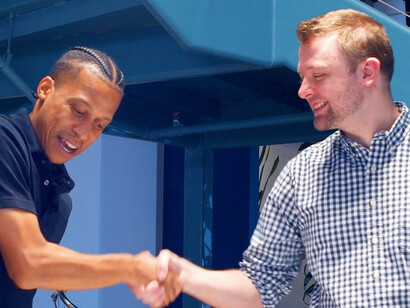 This handshake reflects the shared commitment to growth and success, proving that great leaders uplift those around them