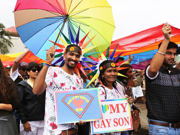 Members and supporters of the lesbian, gay, bisexual, and transgender community, some wearing masks, take part in a Pride March in Bangalore, India, on November 22, 2015