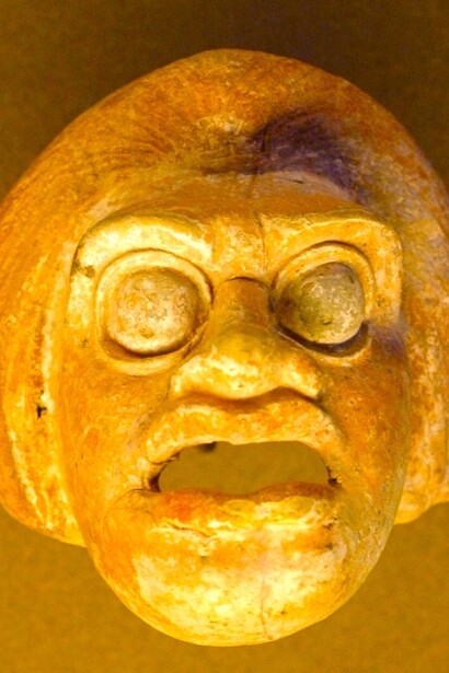 Figura decorativa de una máscara campesina, terracota de Tanagra, Museo del Louvre