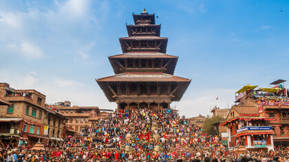 Crowds gather at the Nyatapola Temple in Bhaktapur, Nepal, to watch the vibrant Biskaa Jatra festival