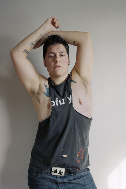 Jess Dugan, Self-portrait (Muscle Shirt), 2016, Archival pigment print.