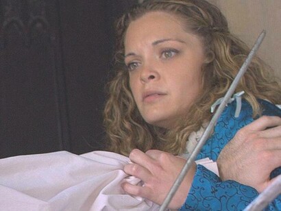 Princess Isabella being shielded away from danger in a scene from the Castle of Otranto 