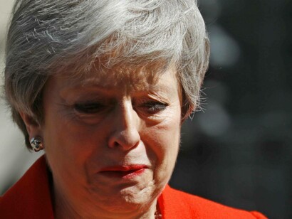 Tears forming in Theresa May's eyes as she realizes she has failed as a Prime Minister