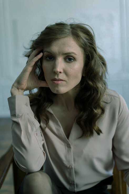 Her contemplative stare reflects the Buddhist understanding that true peace comes from embracing both pleasure and pain, ultimately leading to a state of equanimity