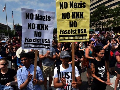 The beliefs, values, norms, symbols, laws and institutions around which the culture is organized are infused with white supremacy ideology